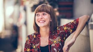 woman smiling after her pulp capping procedure